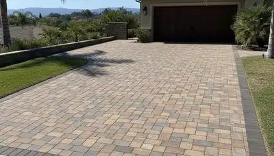 Interlocking paver driveway installation in Escondido, CA with clean lines and expert landscaping finish